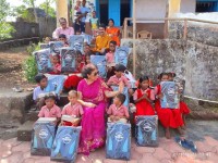 Distribution of foodgrain at Kalechiwadi Neral
